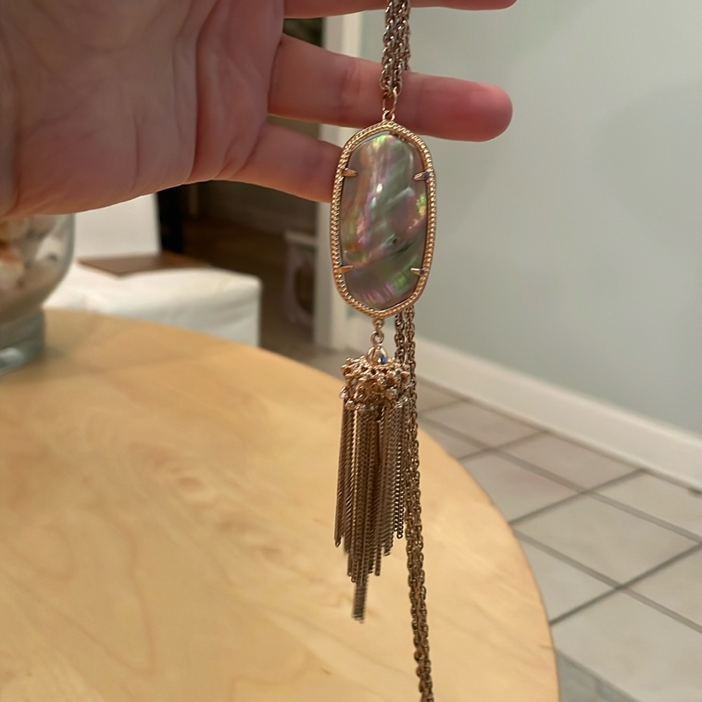 Rose gold necklace with irredecent stone